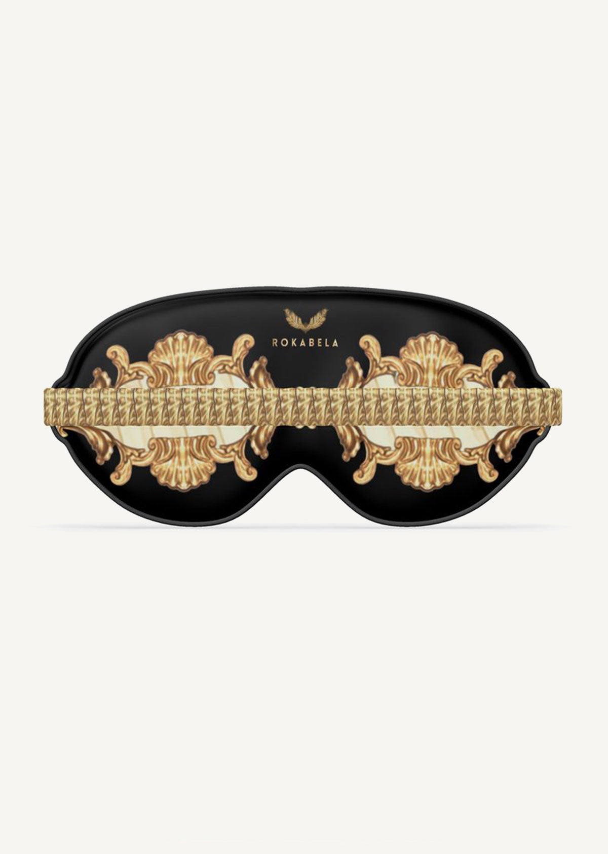 Designer luxury Silk Sleep Eye Mask. Exclusive design featuring Rococo style detail in gold with palm design in soft cream. The perfect designer gift.